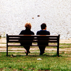 couple sitting on bench